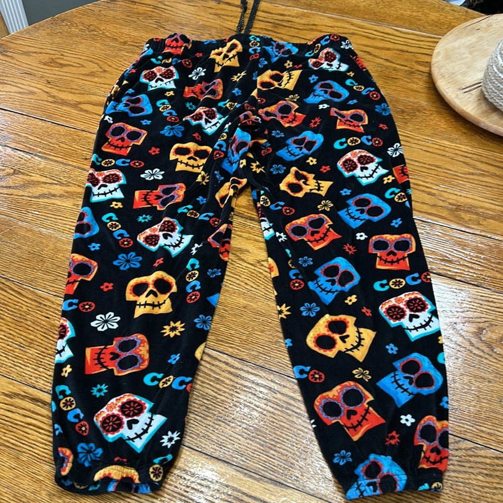 Disney Pixar Coco theme velour pajama pants. Black w/colorful skulls. Size Large - Picture 9 of 10